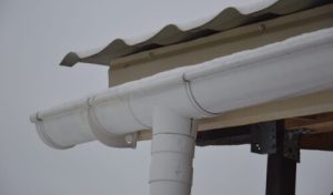 Architectural elements of the building covered with a snow